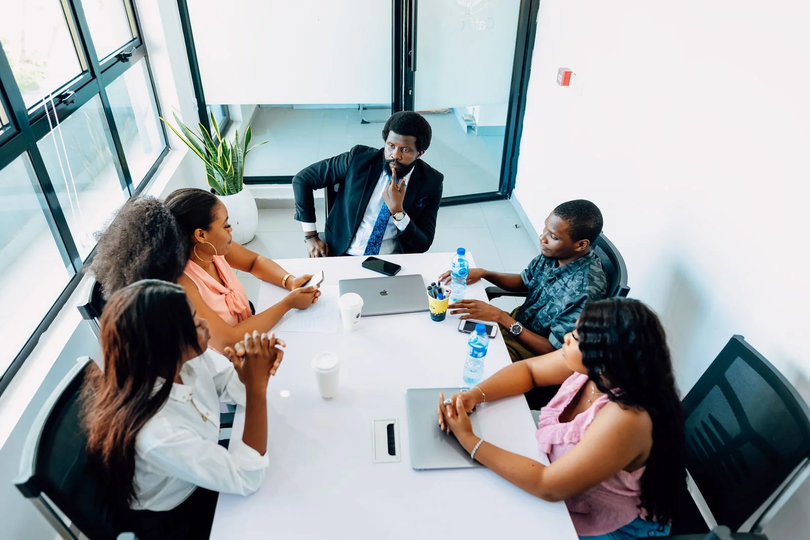 Commercial team reviewing market priorities together